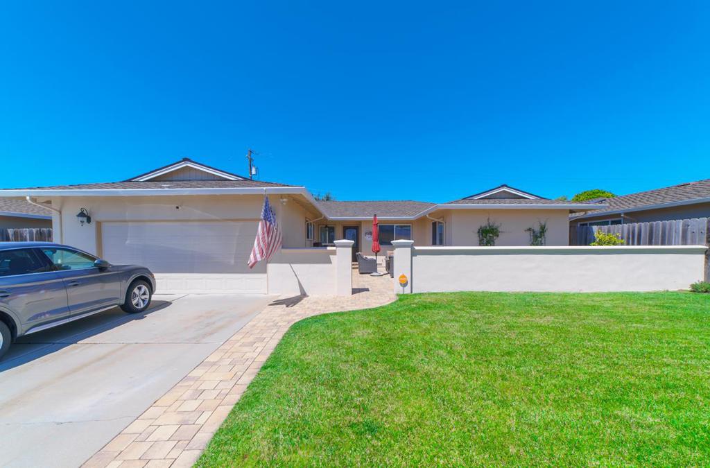 Stylish South Salinas Monterey Park Home. Located towards the very end of La Mesa. 4-bedroom, 2.25-bathroom home offers 2,112 sq ft thoughtfully designed living space on a 6,800 sq ft lot. From the moment you arrive, youll appreciate the inviting front stone courtyard, newer roof (2019), and extra parking available in the driveway. Step inside through the stunning front door to discover a bright, open-concept floor plan with vaulted ceilings, luxury vinyl flooring, and custom designer touches throughout. The heart of the home is the chefs kitchen, featuring high-end appliances, a gorgeous center island, and quality finishesperfect for both everyday living and entertaining. The cozy family room is highlighted by a corner fireplace with a gas insert, ideal for cool Salinas evenings. A 10-foot sliding glass door floods the living area with natural light and provides seamless indoor-outdoor flow to the backyard.All four bedrooms are generously sized, and the primary suite offers a spa-like bathroom with dual sinks, stone flooring, and an oversized walk-in shower. The backyard is an entertainers dream, with plenty of space to relax or gather, plus a greenhouse for gardening enthusiasts.Meticulously maintained, home has a warm, Pottery Barn-inspired feel and is truly move-in ready.