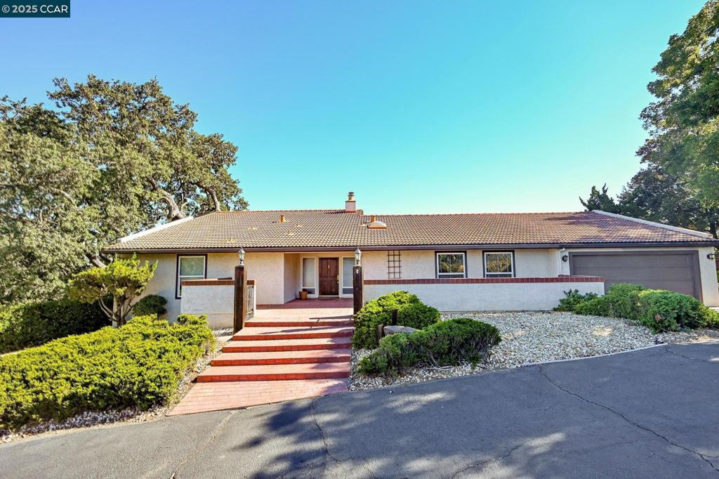 Wonderful custom built, one-story home with Panoramic view! Located in a highly sought-after neighborhood, on a very tranquil and private lot. Formal living room with vaulted ceiling and fireplace. Spacious family room with fireplace. Newer double ovens and dishwasher. Newer Dual Pane windows throughout. Newer front door and the garage door. New paint in the family room, master bedroom, laundry room and kitchen ceiling. Inside laundry (seller is replacing the laundry room door). Concrete tile roof. Minutes from Concord and Pleasant Hill BART, De La Salle and Carondelet High Schools, several shopping centers, restaurants, Lime Ridge hiking trails and neighborhood park with Olympic size pool and tennis courts.