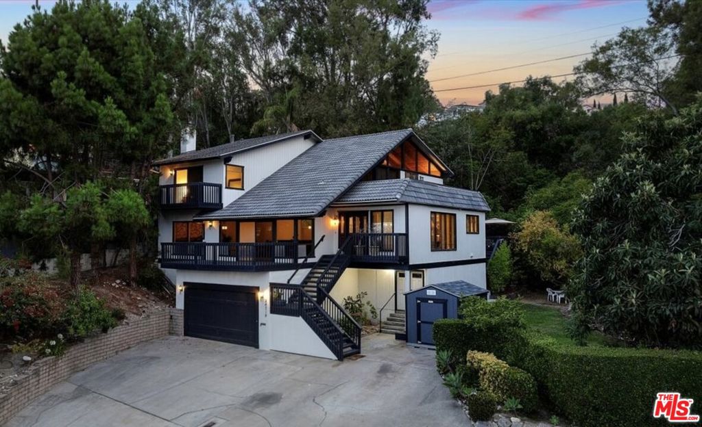 Perched atop one of Torrance's most scenic streets is this rare architectural gem that merges treehouse charm with modern hillside luxury. This 5 bedroom, 3 bath, 3-story retreat is set on a 14,000+ sq ft forested hillside lot, offering breathtaking panoramic city, mountain, and treetop views from nearly every corner. Designed for inspiration and serenity, every detail of the home encourages you to slow down, breathe deep, and take in the surrounding beauty. From its forest-like landscape to its unique treehouse-inspired layout, this is a one-of-a-kind sanctuary meant for connection and peace. Ideal for modern living, the home includes a detached studio/office surrounded by greenery, bonus storage rooms, and a 2-car garage with additional utility space. Meditate or train with focused practice in the private Japanese-style dojo featuring imported tatami mats and authentic shoji screens. The primary suite is a tranquil escape with sweeping views, a spa-style bath, and private access to a viewing deck, perfect for sunrise coffees or sunset reflections. Wake up to uninterrupted views, enjoy dinner on your deck in the trees, and unwind by the outdoor fireplace as the city lights glow in the distance. This exceptional property features a sprawling outdoor space perfect for gatherings, forest adventures, weddings, or backyard sports. The setting feels like a hidden retreat, yet it's just minutes from the beach, top-rated Torrance schools, Palos Verdes hiking trails, and Riviera Village shopping and dining. Whether you're looking for a peaceful family home, a creative haven, or a hillside escape, 24710 Via Valmonte offers it all. Don't miss this rare opportunity to own one of the South Bay's most unique and unforgettable homes.
