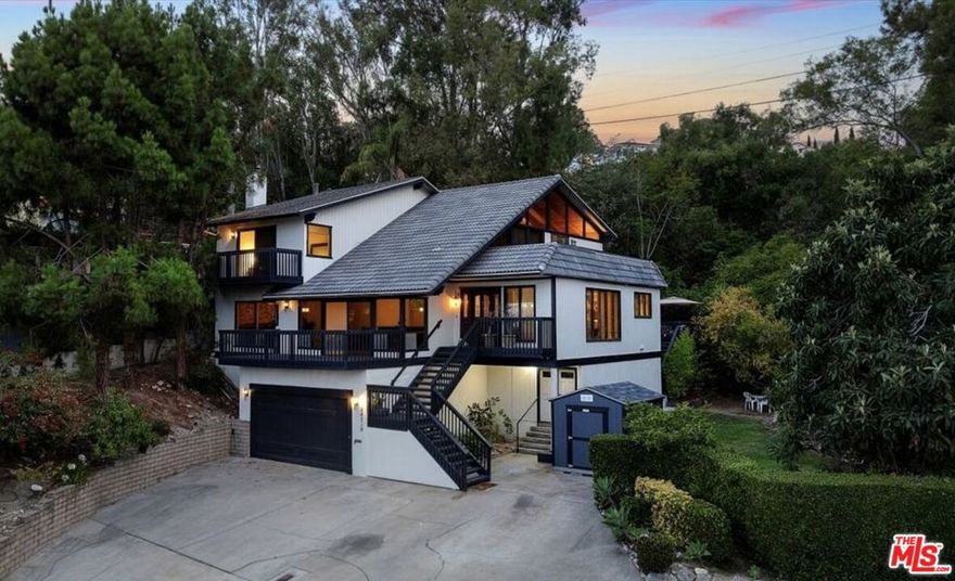 Perched atop one of Torrance's most scenic streets is this rare architectural gem that merges treehouse charm with modern hillside luxury. This 5 bedroom, 3 bath, 3-story retreat is set on a 14,000+ sq ft forested hillside lot, offering breathtaking panoramic city, mountain, and treetop views from nearly every corner. Designed for inspiration and serenity, every detail of the home encourages you to slow down, breathe deep, and take in the surrounding beauty. From its forest-like landscape to its unique treehouse-inspired layout, this is a one-of-a-kind sanctuary meant for connection and peace. Ideal for modern living, the home includes a detached studio/office surrounded by greenery, bonus storage rooms, and a 2-car garage with additional utility space. Meditate or train with focused practice in the private Japanese-style dojo featuring imported tatami mats and authentic shoji screens. The primary suite is a tranquil escape with sweeping views, a spa-style bath, and private access to a viewing deck, perfect for sunrise coffees or sunset reflections. Wake up to uninterrupted views, enjoy dinner on your deck in the trees, and unwind by the outdoor fireplace as the city lights glow in the distance. This exceptional property features a sprawling outdoor space perfect for gatherings, forest adventures, weddings, or backyard sports. The setting feels like a hidden retreat, yet it's just minutes from the beach, top-rated Torrance schools, Palos Verdes hiking trails, and Riviera Village shopping and dining. Whether you're looking for a peaceful family home, a creative haven, or a hillside escape, 24710 Via Valmonte offers it all. Don't miss this rare opportunity to own one of the South Bay's most unique and unforgettable homes.