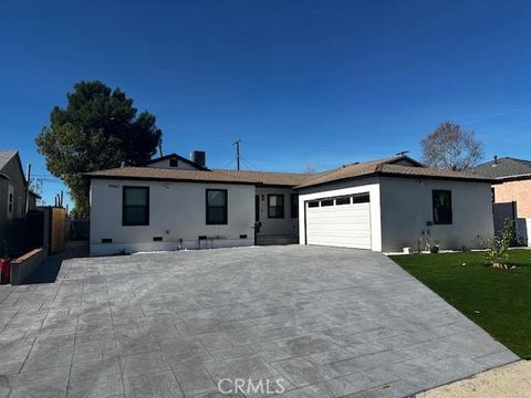 Photo of 9947 Norwich, San Fernando, CA 91345 (MLS # SR26010745)