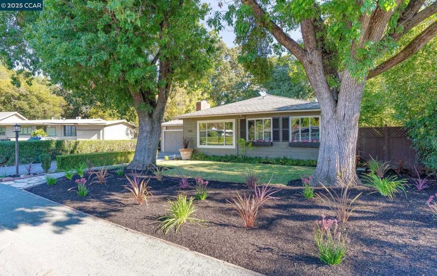 Prime, tranquil, enchanting setting in the coveted Parkmead neighborhood near downtown amenities and top rated schools! Spectacular, level, private, lush backyard setting with a backdrop of majestic trees and foliage! Wood-beam ceilings, gleaming newly refinished oak hardwood flooring, rich tile finishes, and walls of glass looking out to a stunning garden setting! Updated kitchen with solid surface counters, preparation island, stainless steel appliances, pantry, and custom cabinetry! Spacious bedrooms, convenient interior laundry room, elegant bathroom finishes including a copper sink, designer light fixtures, large sun-filled primary suite looking out to the picturesque setting, spacious great room with fireplace and recessed lighting! Inviting entry porch, flexible floorplan layout, entertaining patio, room for a pool/ADU/or other exciting improvements!  Inviting setting with mature trees, boxwood hedges, level lawn, Napa style plantings, ample level yard space, concrete and decomposed granite patio areas, & meandering garden paths! The backyard trellis arbor features an inviting and peaceful creekside vista: a perfect retreat for Summertime gatherings with family & friends! Stroll to downtown's amenities and 12 years of top-rated schools from this awesome Parkmead location!