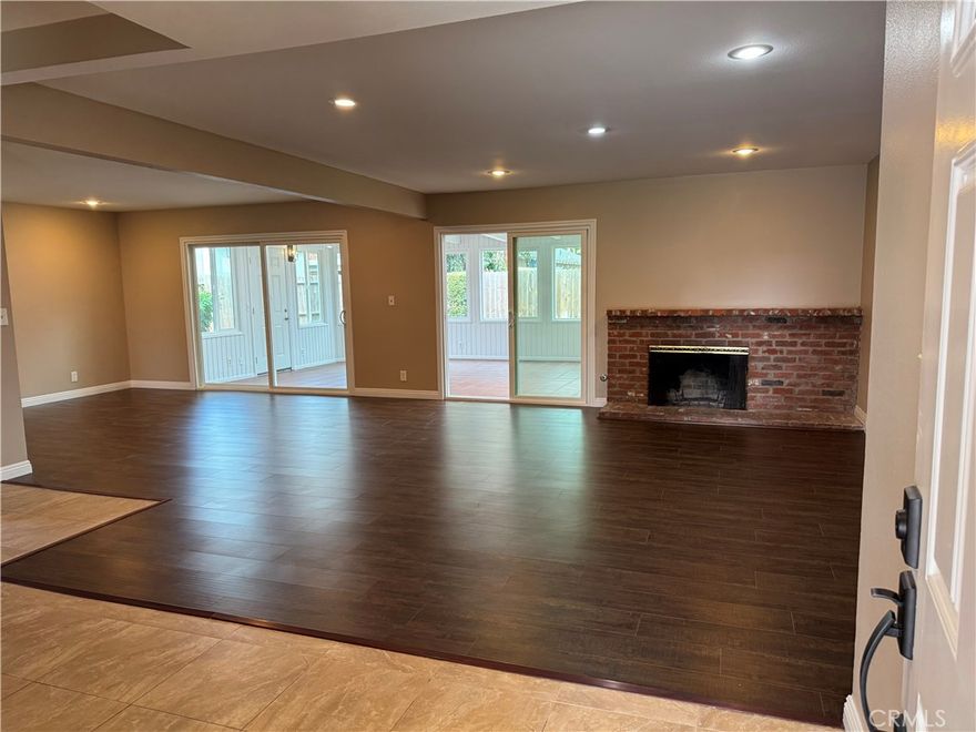House is open, bright, spacious, located in a good neighborhood and it's close to shopping, schools and freeways.  Double door entrance.  Living room with fireplace opens to the dining area and breakfast nook.  New plumbing.  Owners re-piped the whole house in February 2025.  New roof in September 2025.  New rain gutters. New bathroom cabinets, new sinks, new countertops, new mirrors, new shower doors, new closet doors. New doors, windows and lightings in the enclosed patio with 2 skylights. New paint inside and outside. New attic insulation. Master bathroom has 2 bathroom vanities, an extra closet, a makeup vanity and access to the backyard.   Must see!