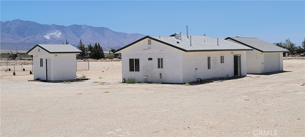 Unit B. A natural oasis comes with 800 sq ft., fully updated, with 3 bedrooms, 2 baths. It comes with a newer stove and dishwasher and washing dryer. There are newly installed hard wood floors in each bedroom and a new A/C mini split installed. It has a TWO car garage with laundry hookups. It is on its own septic tank and all utilities are paid by the owner. Located near Local Stores & Schools. This is a 1-acre property which is plenty of land for those that like to utilize the land to the fullest and be themselves.