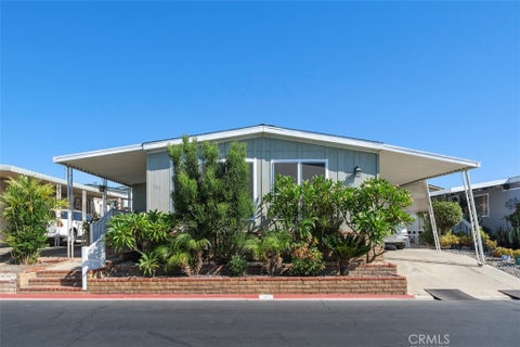 Photo of 1456 E Philadelphia St Spc 303 ST, Ontario, CA 91761 (MLS # IV26203689)