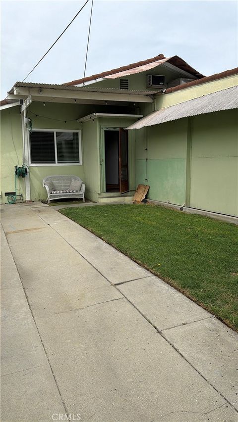 Photo of 9615 Walnut St, Bellflower, CA 90706 (MLS # RS26062016)