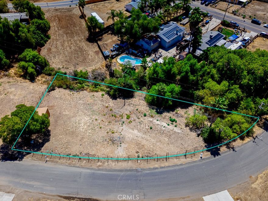 Great investment Opportunity in Menifee. This lot is on a paved road in a great location of up-and-coming City of Menifee. Menifee is growing with lots of potential and new housing and businesses close to Canyon Lake and crossroads of Ethanac, off the 215 freeway. It's a quick drive to Hwy 15 and 215. This lot has a water meter and electricity nearby. For more information on building and/or development reach out to the city. Low taxes and no HOA. Buyer and buyer's agent to verify and inspect all aspects including water district and the city to get specific information on what can or can't be built on this land before the close of escrow.