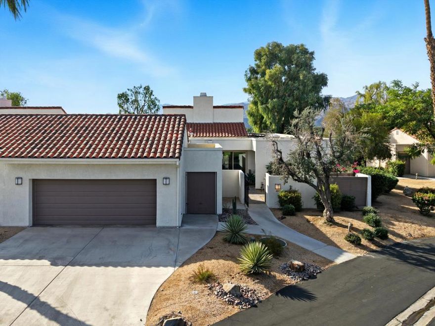 **Discover the perfect blend of modern elegance and desert lifestyle** in this stunningly remodeled 3-bedroom, 3-bath home, complete with a family room and a dramatic great room with soaring vaulted ceilings--ideal for hosting family and friends.The **chef-inspired kitchen** has been completely redesigned with abundant custom cabinetry, sleek new appliances, and generous counter space, making it a true centerpiece of the home.Step through a private courtyard into a seamless indoor/outdoor living experience. The back patio is an entertainer's dream, offering **breathtaking golf course and mountain views**--the perfect backdrop for morning coffee or evening gatherings.The **luxurious primary suite** boasts a spa-like bath with a walk-in shower and exceptional closet space. Two beautifully appointed guest rooms with adjacent baths provide comfort and privacy for visitors.Practicality meets convenience with a **two-car garage**, separate **golf cart garage**, **solar panels**, and an **EV charging station**--all designed for modern living.Ideally located just minutes from **world-class shopping, dining, and entertainment**, this home offers the ultimate seasonal escape or full-time retreat.> *Availability: Not offered October 1, 2025 - April 2026.*