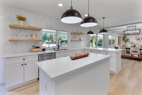 Photo of 10900 Remmet Avenue, Chatsworth, CA 91311 (MLS # IG26046245)