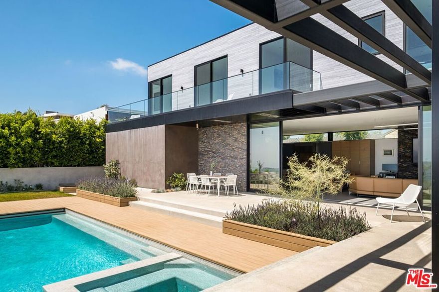 With one of the most picturesque settings in Los Angeles this property is perched on the coveted street of Stradella Rd which is also home to one of most iconic properties, "The One."  Experience peace & serenity floating over the city in the hills of Bel-Air, w/ breathtaking water (reservoir), mountain & city views below. Centrally located just minutes to the heart of town & valley, this recently completed modern masterpiece w/ fire resistant cement cladding, steel & brick exterior, w/ open spaces & high-ceilings flooded w/ natural light. Hafale & Fleetwood sliding doors & windows throughout, seamlessly creating the perfect indoor/outdoor environment. Clean design details w/ warm finishes, custom Danish brick beautiful Shou Sugi Ban wood paneling. The home is all dialed in w/ the latest Crestron controls, Sonance audio throughout & a Color Beam LED lighting system. 4 en-suite view bedrooms upstairs including office, w/ a 5th bedroom view suite downstairs w/ private view deck. Tonal home gym, dry sauna. Salt Water CO2 UV Pool & Spa system w/ cover, grass area, decks, outdoor fireplace & your own personal orchard w/ blood orange, fig, citrus, passionfruit, tangerine, peach, Hass & Fuerte avocado trees. Whole house water softening system & separate drinking water purification system, Toto toilets, Miele appliances, backup generator, solar ready & so much more. A truly exceptional residence.