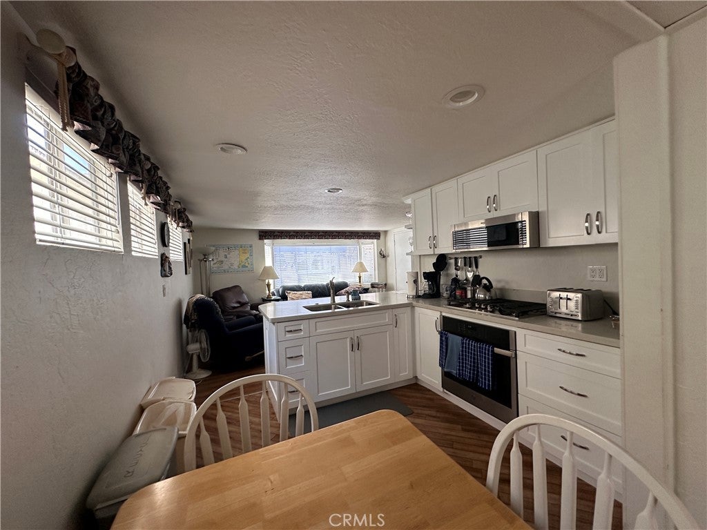 Photo of 352 Eucalyptus Ave, Avalon, CA 90704 (MLS # OC26198191)