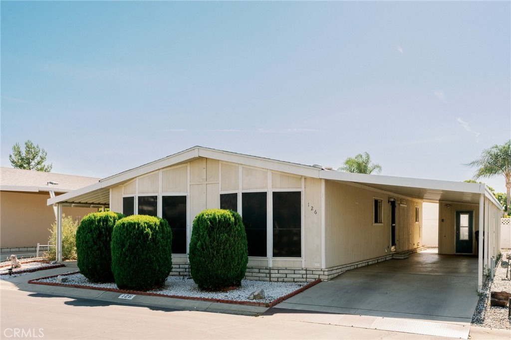 This charming 2-bedroom, 2-bathroom home is located in a vibrant 55+ mobile home park, offering the perfect blend of comfort and convenience. The spacious open living and dining area is enhanced by newer flooring throughout, creating a bright and inviting atmosphere. Enjoy stunning views of the San Jacinto Mountains right from your window. The community clubhouse features a sparkling swimming pool and a variety of social activities, providing plenty of opportunities to relax and connect with neighbors. This is the ideal place to embrace a carefree lifestyle in a welcoming community!