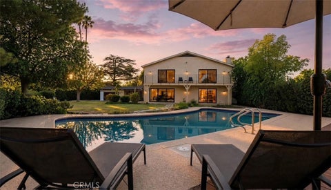 Photo of 5950 Winnetka AVE, Woodland Hills, CA 91367 (MLS # SR26164625)