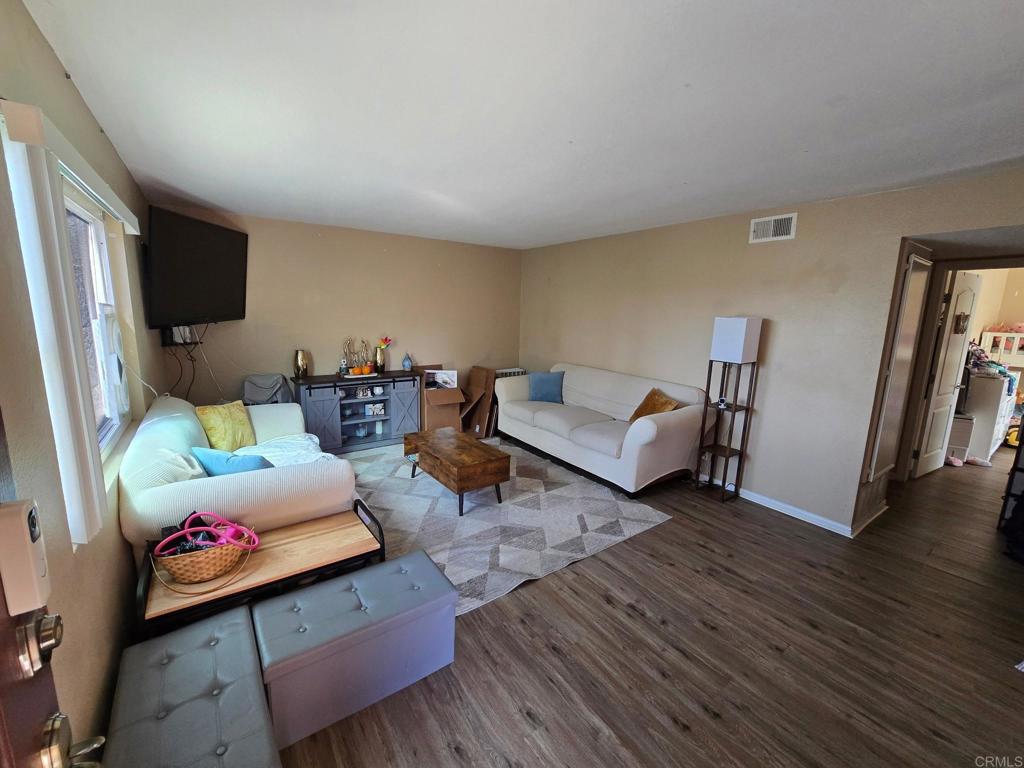 Clean 2 bedroom 1 bath upstairs end unit condo with view. Kitchen has granite countertops. Refrigerator, washer and dryer included. Carport. Complex has a pool and lake with walking trails.  Good credit required.  Available 1/1/26.