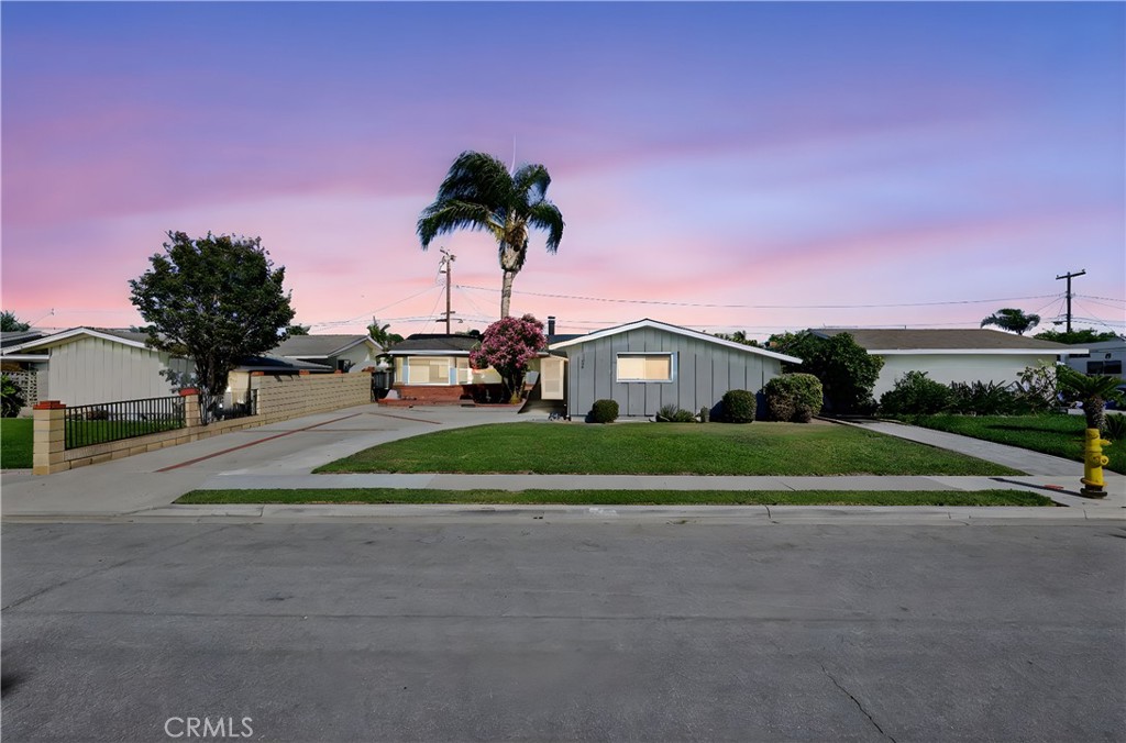 CHARMING, BRIGHT, and FULL OF POTENTIAL – ALL FOR UNDER $1M!!! WELCOME to your next dream home or investment opportunity in the heart of Orange County, where Westminster meets Huntington Beach and the coastal breeze rolls in all year long. Step into this sun-soaked, 3 bedrooms, 2 baths home offering 1,525 sqft of thoughtfully designed living space on a nice 7,405 sqft lot. Perfect for first-time buyers, families, or investors looking to add a gem to their portfolio. Enjoy a bright and airy atmosphere throughout with windows in every bedroom and living space that floods the home with natural light. The kitchen is ideally placed between the main living room and a bonus family room with vaulted ceilings, creating a natural flow that’s perfect for entertaining. Want that ultimate open-concept design? Open up one wall and instantly connect your living, kitchen, and family room into one seamless entertaining hub. Bring the RV, boat, and the whole car collection, this home boasts a massive driveway with space to fit it all. The huge, squared backyard is your blank canvas. Whether it’s hosting summer BBQs, building your dream pool, expanding the home, or adding a detached 1,200 sqft ADU for extra rental income, you’ve got space to make it happen. The home is surrounded by tall block retaining walls, you’ll enjoy privacy and peace of mind. It is also nestled in a quiet, clean neighborhood, just minutes from the beach, the 405 & 22 freeways, and a quick hop to all your daily needs such as Aldi, Albertsons, restaurants, Home Depot, movie theaters, malls, and more. You're also just 5-10 minutes from Little Saigon; hello, delicious Vietnamese food and cultural conveniences. Furthermore, it's located in the prestigious Huntington Beach Union High School District, offering excellent education options for your family or future tenants. There is a solar system to help offer you lower electricity bills. Whether you’re looking to settle in and make it your forever home or capitalize on an investment with huge upside, this property checks every box. DON'T MISS OUT, come see it in person and fall in love with the lifestyle and possibilities. Schedule your private tour today before it's gone!