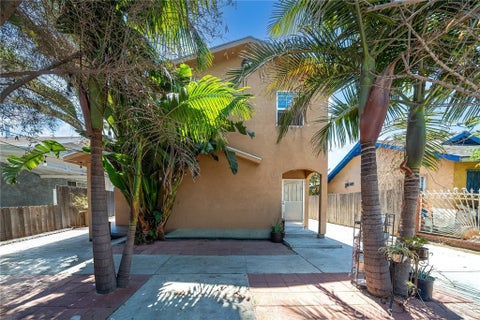 Photo of 1214 E -1216 E 66th ST, Los Angeles, CA 90001 (MLS # WS26184440)