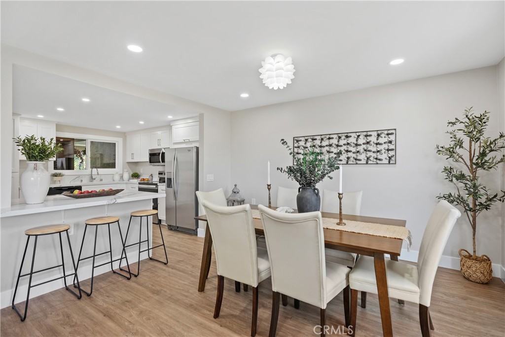 Welcome to this beautiful completely remodeled (2bd/2ba) “VILLA NUEVA” LOCATED in the prestigious community of Laguna Woods.
The home boasts a large, enclosed balcony with breathtaking open views of Saddleback mountains and lush greenbelts. Enter to a modern elegant open concept design that makes this a perfect home for entertaining. New flooring, baseboards & recessed lighting throughout. The stunning kitchen is both functional and fashionable with new cabinets, quartz counters, backsplash, newer appliances, sink, and fixtures. All new remodeled and updated bathrooms, new laundry in hallway closet with new luxury washer/dryer. Redefined AC/HEAT pump system. Both bedrooms are very spacious and have tree top views. The primary bedroom suite offers a tranquil sanctuary with an elegant spa-style bathroom, plenty of closet space and natural light. The secondary bedroom makes for a great guest room or office. The home has no steps and elevator for easy access. Located in Laguna Woods Village, Southern California’s best kept 55 plus active retirement community. You can access world-class amenities including 27-hole golf course with its own clubhouse & 9-hole par 3 executive course. An equestrian center, 7 clubhouses, 5 swimming pools, tennis complex, pickleball, fitness centers, and various social clubs and activities for adult lifestyles. 24-hour guard gated community within minutes to some of Southern California famous beaches; Laguna Beach, Newport Coast Beach. Close to all shopping, restaurants, freeways, toll roads, and medical facilities. Additionally, the community has a economical RV storage area to park your RV if needed. Country Club Living at its best, truly a great place to live!!