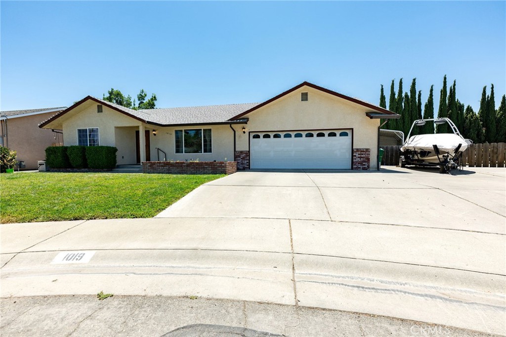 Tucked away at the end of a quiet cul-de-sac in the sought-after Tanner-built subdivision, this beautifully updated 3-bedroom, 2.5-.throom home offers 1,698 sq. ft. of comfort, charm, and functionality—all on an oversized lot with RV parking, an RV cover and SOLAR. Step inside to a light-filled, open floor plan where fresh paint, stylish new fixtures, updated doors, and brand-new flooring (bedrooms being finished now) create a warm, modern atmosphere. The living room invites you to relax by the updated fireplace, while the dining area delights with a full wall of built-in cabinetry—perfect for storage and display. The kitchen has been thoughtfully refreshed with freshly painted cabinets, offering a timeless look that’s ready for everything from quick weekday meals to holiday entertaining. Generously sized bedrooms provide plenty of room to unwind, and the whole house fan, along with budget-friendly solar (true-up has kept summer cooling in the low 60s), ensures year-round comfort. Even the oversized garage is thoughtfully designed, featuring a convenient half bath and conversion potential. Outside, lush green lawns set the tone for easy outdoor living. Host gatherings under the covered patio, enjoy the privacy of your backyard, or take advantage of the RV cover and the potential for a shop conversion. With space to spread out and relax, this property truly feels like home. The location adds even more appeal—stroll through the peaceful neighborhood, or enjoy nearby parks, schools, shopping, dining, pickleball and tennis courts, the lake, and endless riding and hiking trails. Whether you’re entertaining friends or enjoying quiet everyday moments, this home checks every box—and more. It’s not just a place to live, it’s a place to love. if price shows increase it is because error was made when making a price decrease .Sq. ft., year built taken from county records. Buyer to verify to their satiisfaction.