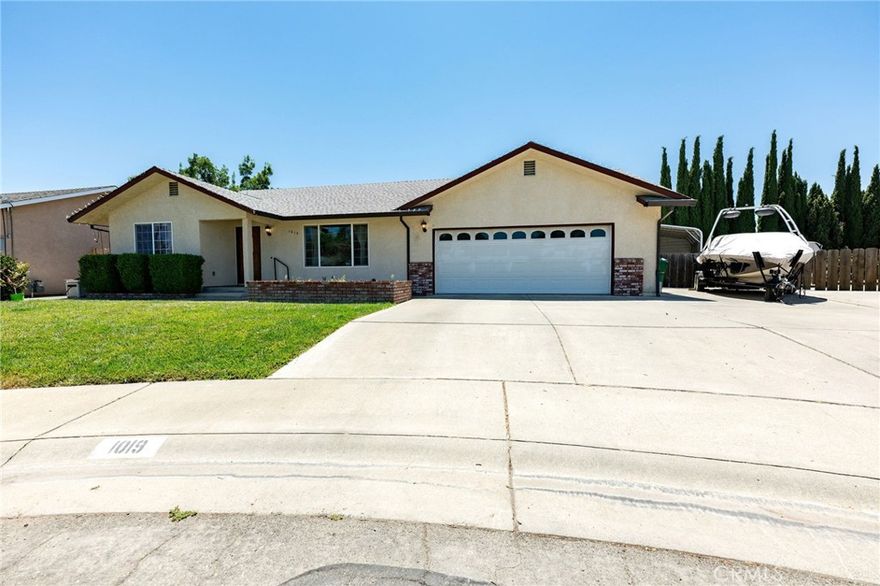 Tucked away at the end of a quiet cul-de-sac in the sought-after Tanner-built subdivision, this beautifully updated 3-bedroom, 2.5-.throom home offers 1,698 sq. ft. of comfort, charm, and functionality—all on an oversized lot with RV parking, an RV cover and SOLAR.  Step inside to a light-filled, open floor plan where fresh paint, stylish new fixtures, updated doors, and brand-new flooring (bedrooms being finished now) create a warm, modern atmosphere. The living room invites you to relax by the updated fireplace, while the dining area delights with a full wall of built-in cabinetry—perfect for storage and display. The kitchen has been thoughtfully refreshed with freshly painted cabinets, offering a timeless look that’s ready for everything from quick weekday meals to holiday entertaining.  Generously sized bedrooms provide plenty of room to unwind, and the whole house fan, along with budget-friendly solar (true-up has kept summer cooling in the low 60s), ensures year-round comfort. Even the oversized garage is thoughtfully designed, featuring a convenient half bath and conversion potential.  Outside, lush green lawns set the tone for easy outdoor living. Host gatherings under the covered patio, enjoy the privacy of your backyard, or take advantage of the RV cover and the potential for a shop conversion. With space to spread out and relax, this property truly feels like home. The location adds even more appeal—stroll through the peaceful neighborhood, or enjoy nearby parks, schools, shopping, dining, pickleball and tennis courts, the lake, and endless riding and hiking trails. Whether you’re entertaining friends or enjoying quiet everyday moments, this home checks every box—and more.  It’s not just a place to live, it’s a place to love. if price shows increase it is because error was made when making a price decrease .Sq. ft., year  built taken from county records.  Buyer to verify to their satiisfaction.