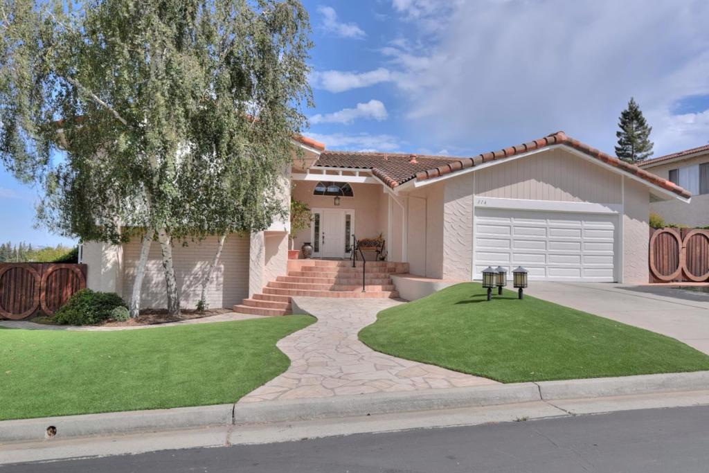 Exciting home with spectacular views! Sweeping flagstone stairway leads to a dramatic entry with hrdwd floors and vaulted ceiling.Step thru french doors in the office to the deck, overlooking the valley and lush landscpng of the yard w/pond-waterfall and stream. Huge mstr suite-2 walk-in clsts-2 sep mstr baths rmdld with marble-frplc & more views. The great room has soaring ceilings. The kit has been remdld with slab granite and stone flr & large walk-in pantry. Spa is built in under one of the gazebos.WOW