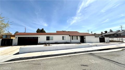 Photo of 821 Caliente Dr, Barstow, CA 92311 (MLS # CV26057677)