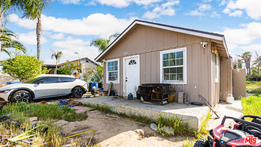 Cozy 3-Bedroom Fixer Home on Large Lot in Corona! Sitting on a quiet cul-de-sac, this home features vaulted ceilings throughout. Huge backyard. Possible room to add square footage to existing structure. Fully gated lot. Easy freeway access & just minutes to the best shopping, dining, & entertainment the area has to offer. A great opportunity for homeowner & investor alike!