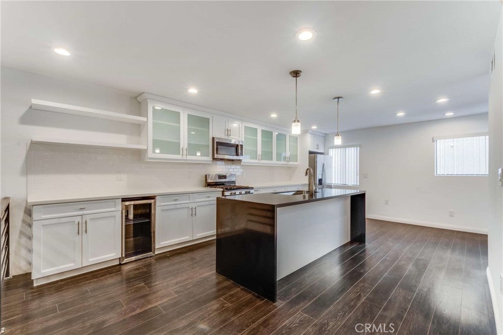 15133 Magnolia Boulevard D