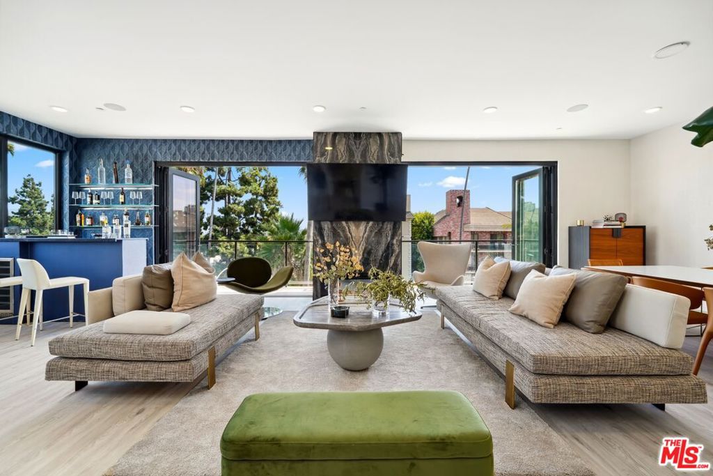 Welcome to 137 Doheny where timeless elegance meets modern design in one of LA's most sought-after neighborhoods. Each residence occupies an entire floor with private, coded elevator access, offering unmatched privacy and exclusivity. Featuring three bedrooms, and a versatile fourth room, a Bosch-equipped kitchen, and spacious dining and living areas, every detail is crafted for comfort and sophistication. Large windows flood the interiors with natural light, opening to private terraces with stunning views, while amenities like a rooftop escape, state-of-the-art gym, and secure marbled lobby elevate the experience. Located steps from Beverly Boulevard, the Four Seasons, Bristol Farms, and premier dining, 137 Doheny is the pinnacle of luxury living. Now leasing exclusively for 13+month terms. Your perfect home awaits.
