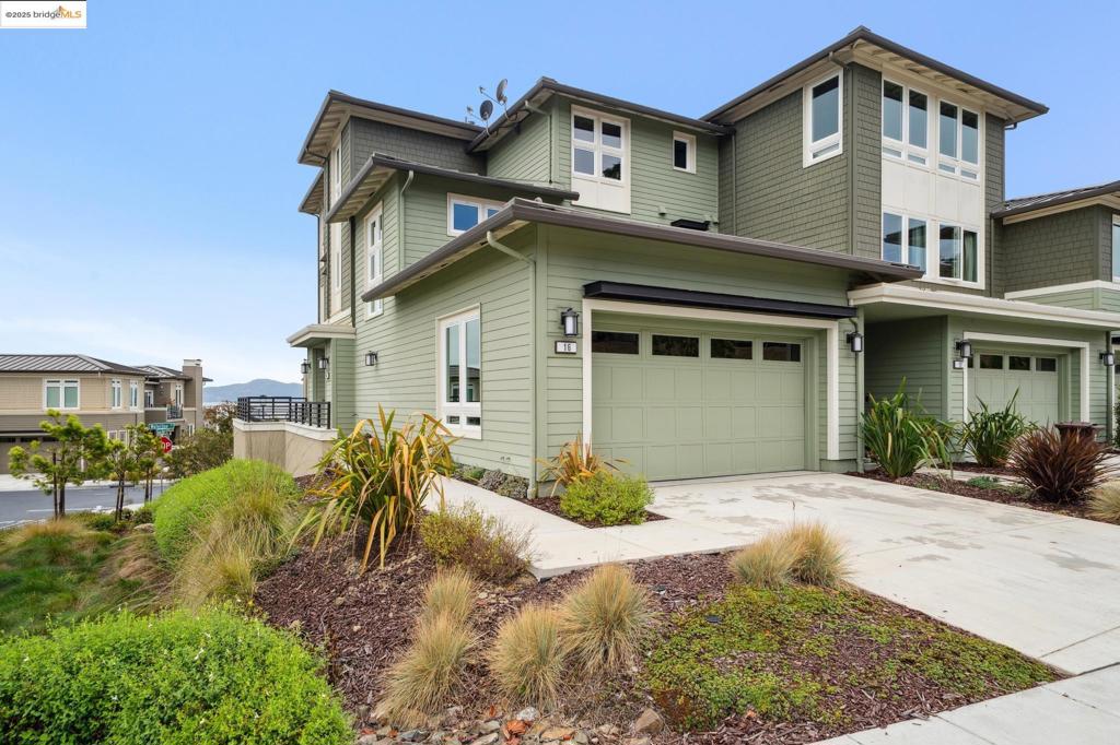 The Ultimate Seaside sanctuary, modern one level living with large spacious rooms, high ceilings and comfortable floor plan. An entry foyer leads upwards revealing an open floorplan with serene bay and harbor views from kitchen, open dining / living room and spacious primary suite. The cook’s kitchen combines quartz counters, an island big enough for a dinner party or a quiet meal. Dining area opens to protected deck, the perfect place to enjoy sunsets, sail boats, the occasional passing ship or a good book. Because this is an end unit the rooms are bathed in natural light from two sides, creating inviting sun lit spaces. Primary suite has a wall of windows, 2 large walk-in closets and a spa line primary bath. For those that enjoy outdoor living without maintenance, you are only steps from Bayshore’s oceanfront bike path and a short walk to Richmond Yacht Club. This secluded community is only a few minutes to local shops and restaurants in quint old town Pt Richmond. Easy access to Highway 580 and the Richmond Ferry to San Francisco.