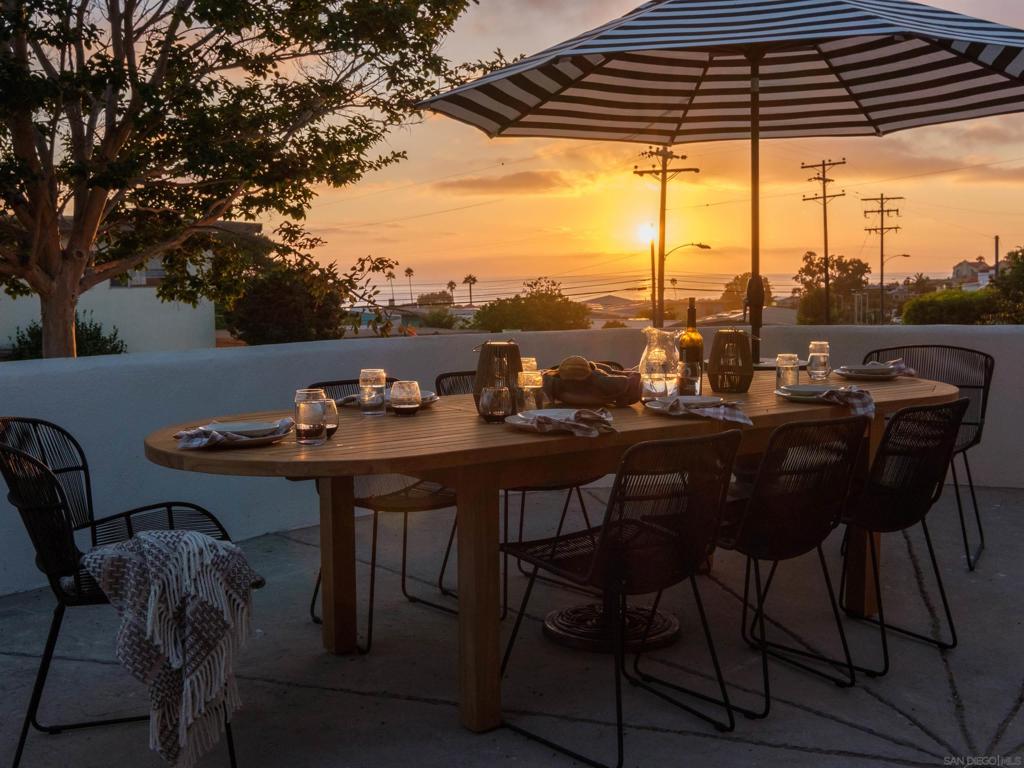 Experience coastal luxury in this fully renovated 2024 retreat, where panoramic ocean views greet you from the kitchen, living room, and expansive patio. Located West of the 5 in Cardiff's most coveted neighborhood just a 5-minute walk to Waverly restaurant, Seaside Market, and the Coastal Rail Trail - and moments from iconic surf spots like Swami’s and Cardiff Beach - this home is a perfect blend of style and location. Step inside to discover a designer-curated interior featuring engineered European white oak flooring, Carrara marble kitchen and bathroom counters, and custom cabinetry throughout. The chef’s kitchen is anchored by a 6-foot Carrara marble island, custom hood, and a spacious appliance bar with Fisher & Paykel and Bosch panel-ready appliances. A Rohl polished nickel kitchen faucet and pot filler add refined touches. Indoor/outdoor living is effortless with a 10-ft full-panel sliding glass door connecting the open-concept living room to the ocean-facing patio and outdoor dining area. Bathrooms showcase Bedrosian, Concrete Collective, and Zellige tilework with unlacquered brass fixtures. The detached room bathroom features a one-of-a-kind hand-carved grooved-front sink in Calacatta Viola marble. Offered fully furnished, this home invites you to settle into relaxed coastal elegance with ease.