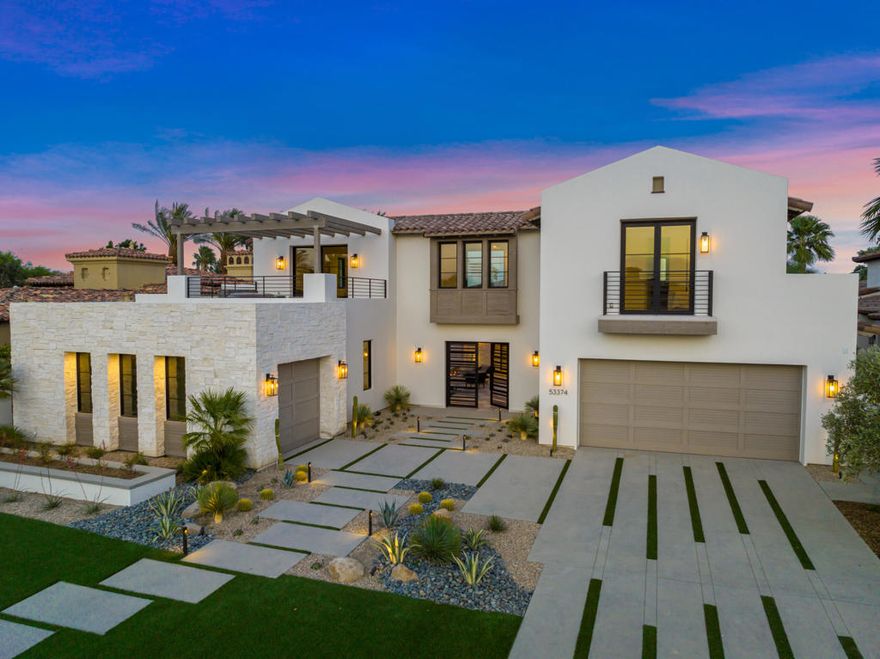 Brand new construction... this stunning modern estate has just been completed at the Hideaway! Five bedrooms, five and a half baths plus bonus room. Approx. 5,692 sq. ft. on .35 acre lot. Features private courtyard entry with linear fireplace and glass door entry to great room with soaring ceiling, custom fireplace with media, formal dining room and modern design walk in wine room with custom lights and showcasing wine racks for the wine connoisseur. Thoroughly modern stainless kitchen with ergonomically designed kitchen island with two level seating and floating ceiling. Large master suite with with custom fireplace, media, sitting area and spa inspired bath with double vanities, soaking tub and Cosmic white porcelain shower. All ensuite guest accommodations including two mountain view suites which are accessed by walking across a two sided view bridge, plus a bonus room with a huge balcony and west facing mountain views. This home showcases the finest architectural details, finishes and textiles throughout. Opening walls of glass combine the indoor and outdoor living spaces. Loggia features a two-way fireplace facing back to the master patio. Custom zero edge infinity pool with tanning shelf and separate spa. Built-in BBQ center and custom fire pit with seating area. Beautiful waterfall and waterway views located on the 16th green of the Clive Clark course. Designer furnishings are included. Membership is available through the club.