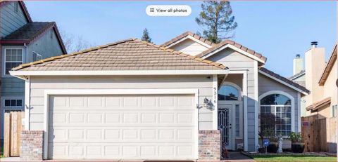 Photo of 9316 Caulfield Drive, Elk Grove, CA 95758 (MLS # ML82026027) Photo of 9316 Caulfield Drive, Elk Grove, CA 95758 (MLS # ML82026027)