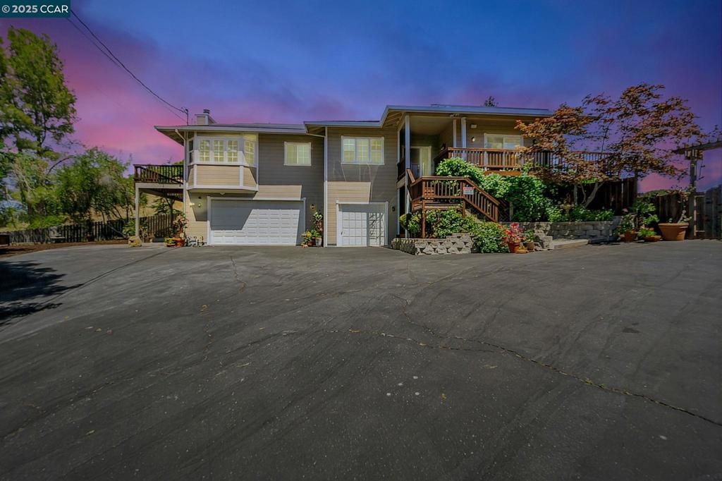 Trustee sale. Beautiful and stunning describes this remodeled 4 bedroom 4 bath home in one of Walnut Creek's finest neighborhoods. This home is in a class by itself! Rarely does a property as magnificent as this appear on the market. Tucked up against a hillside on 1/2 an acre, this home has everything you've dreamed about. As you drive up, the property welcomes you with views of the rolling hillside, wraparound wooden deck, and a well manicured yard designed to turn heads. Step inside to enjoy over 2000 sq ft of beautiful interior with recessed lighting, a dramatic fireplace, stunning hardwood flooring with inlays and a formal dining area perfect for entertaining. Enjoy your dream kitchen with Quartz countertops, beautiful backsplash and appliances, and a large bar. Escape to the Master Retreat complete with a stove fireplace, walk-in closet, and a sliding glass door accessible to an outdoor sitting area. A perfect haven after a long day! The beautiful backyard includes a gorgeous deck and hot tub with trees and flowers and views of those rolling hills sure to impress. Includes a whole house solar system & room for ADU. Includes plenty of space to park multiple cars and a huge R.V. This is a special home and the owners are motivated.