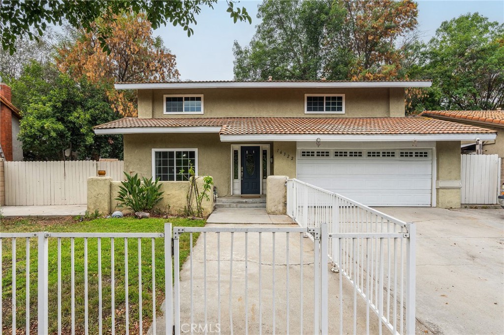 Welcome to this charming home located in a well-established neighborhood in the heart of La Puente. Step into a beautiful laminate entryway that leads to a spacious, step-down formal living room seamlessly connected to the family room and large dining area—perfect for entertaining or relaxing with loved ones.
Enjoy plenty of natural light throughout, with large sliding doors across the back of the family and dining rooms that offer stunning views of the hills and city lights.
The kitchen features granite countertops and ample cabinetry, ideal for any home chef. All bedrooms are located upstairs and are generously sized—perfect for a growing family—with ceiling fans in each room for added comfort. The master suite includes a walk-in closet and a recently remodeled tile shower.
The private front and back yards are fully fenced, offering security and space for kids or pets. The backyard also features a spacious cement patio, perfect for outdoor entertaining. A convenient downstairs ¾ guest bath adds to the home’s functionality.
Located just steps from Workman and Hurley Elementary Schools, Pacific Palms Golf Course, the 60 Freeway, shops, and more—this home truly has it all!