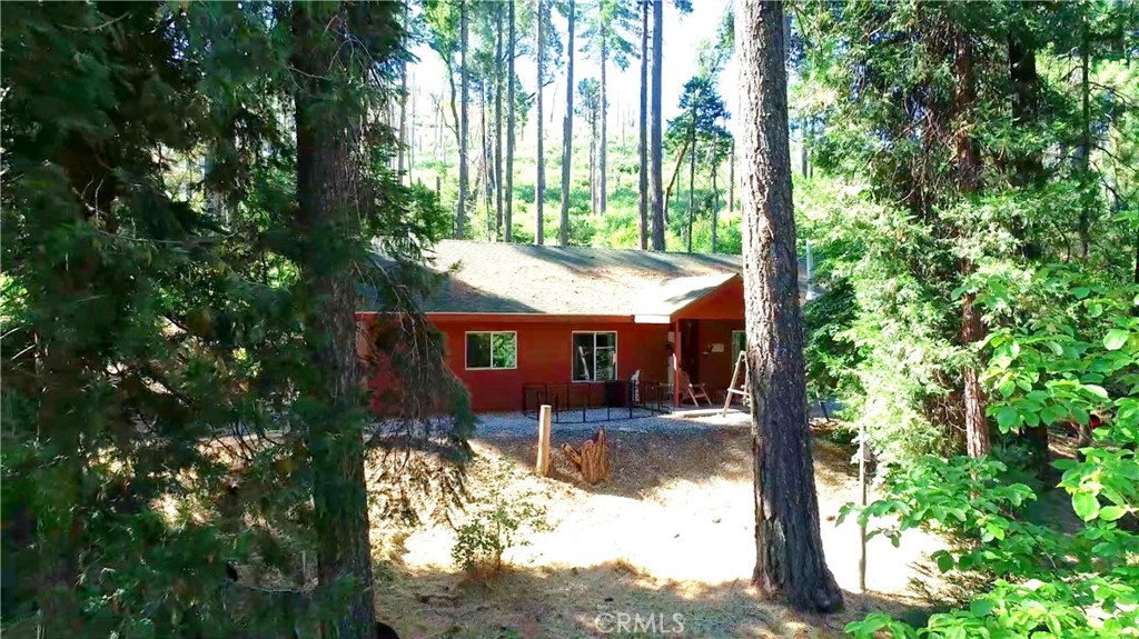 Looking for a place to be where you can hear yourself think, have less stress and get away from your busy life? This cute little cabin type home might be just the place. Featuring a compact design and open floor plan creating a spacious feel. If you think you would love being tucked away amidst the majestic Pine and Cedar trees then you will love Jerseydale. Driving distance is 30 minutes to cooler temps in the summer and the experience of 4 seasons. Operating as an Airbnb for the past few years this is the perfect setup for the buyer wanting to keep this idea in who is ready to jump in. The cozy wood stove, hardwood flooring and large picture windows will no doubt draw you in and invite you to sit with a good book reveling in the peace and quiet or enjoy your meals outdoors while connecting with the likes of nature. Kitchen pantry will allow you to stock up and maybe skip those unnecessary trips to town. Indoor laundry and an oversized two car garage will provide convenience and some additional space. Low maintenance yard so you can enjoy your time here instead of working. Can you imagine treating yourself to daily walks where you can experience nature with all your senses, revel in the towering Pines and enjoy the calm that comes with living the simple life? There is so much to appreciate here spending time away from all the noise and the nonsense. Starting with time spent unplugging and recharging. If this is the place you've been looking for and you are ready to make that move ... Why not here? Why not now?