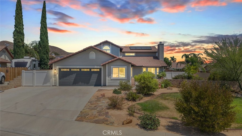 Welcome Home! This “Completely Remodeled” home is a rare find! Situated in a cul-de-sac, with gated RV parking. This home is stunning! Offering approximately 2064 square feet. Luxury vinyl planking throughout the entire home. 3 spacious bedrooms and 2.5 bathrooms. Brand new kitchen featuring a bar for dining, stainless steel appliances, quartz countertops, new shaker cabinets and walk in pantry. The kitchen seamlessly opens to the family room and dining room. Fully remodeled bathrooms. Primary bathroom includes dual sinks, large walk in shower and deep soaking tub. Additional interior features include paid off solar, new vinyl windows throughout, indoor laundry room with washer/dryer included, ceiling fans, quartz counters throughout, mirrored wardrobe and so much more! The backyard offers. A large private patio, vinyl patio cover, above ground spa, perfect for unwinding after a long day. For those with an adventurous spirit, the property includes dedicated RV parking, ensuring your travel-ready vehicle has a secure spot. This home is a rare find, move in ready and like brand new! Don’t Miss Out! This home will sell fast.