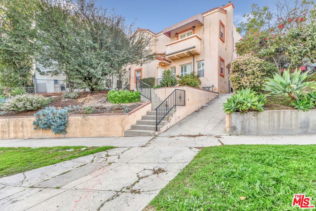 Beautifully updated 1928 Spanish-style duplex in the heart of Mid-City featuring two spacious 3-bedroom, 2-bathroom units, each offering a perfect blend of original character and modern upgrades. Both units boast sun-drenched living rooms with hardwood floors, large windows, and elegant archways, along with remodeled kitchens featuring granite countertops and stainless steel appliances. Each unit includes in-unit laundry, updated bathrooms, and generous closet space. Situated on a large lot with a detached 2-car garage and ample off-street parking, this property is ideal for an owner-user or investor seeking strong rental income in a prime central Los Angeles location close to Hancock Park, Miracle Mile, and public transit. Unit #1 will be delivered vacant.