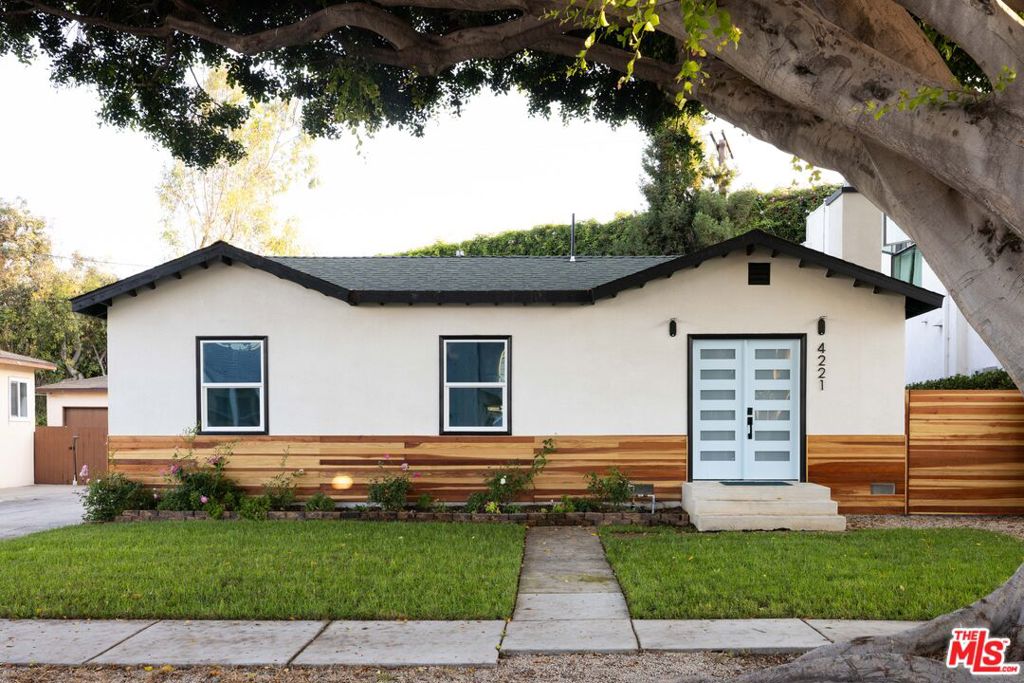 Tucked away in a tranquil cul-de-sac in the small residential enclave of Clarkdale, RINCONADA--meaning a quiet nook or secluded corner--is a hidden gem offering exceptional value to those seeking a balance of suburban calm and urban convenience. Shielded by a formidable sound wall along the 405, RINCONADA is a serene retreat found deep within one of Los Angeles' most beloved Westside neighborhoods. This fully redesigned and newly expanded 1947 California Bungalow, with 3 beds + 1.75 baths, feels remarkably peaceful, private, and still connected to everything there is to love about Culver City. Clean modern design meets warm Westside charm across an open layout in this light-filled home with spacious rooms, brand new kitchen & bathrooms, and functional upgrades throughout. Lush greenery blankets the backyard, punctuated by bright, beautiful flowers. A vibrant tree ring of impatiens and petunias blooms under the dappled and protective canopy of a towering native Coast Redwood. Two stately Palms stand guard, as mature vines climb the fortress wall, enhancing the sense of quietude and seclusion. Beyond the wooden privacy gate, an extended driveway presents an ideal spot for outdoor lounging and al fresco dining, while a detached garage provides extra flexibility for additional parking, storage, or even a future studio space/ADU. Centrally located, just minutes away from Downtown Culver City, the Culver City Unified School District campus, and Sony Studios. Hop on the Culver Blvd Pathway at the end of the block and grab a bite to eat at Hollywood haunt, Dear John's, right across the street! Make this home yours!