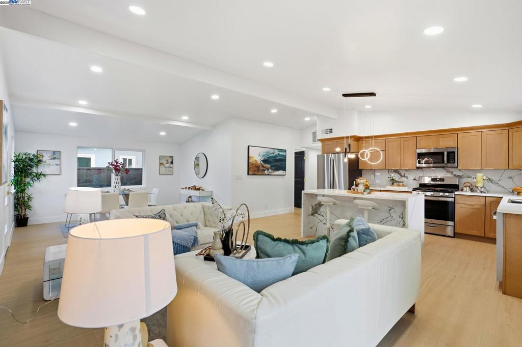 Welcome to 2710 Ocala St, a move-in ready gem in Hayward's desirable Glen Eden neighborhood. Completely renovated this home features a brand-new kitchen with quartz counters, new cabinets, and stainless steel appliances, along with fully updated bathrooms showcasing modern vanities, fixtures, and high-end bidets. Interior design touches throughout include stylish new flooring, fresh paint, new light fixtures, recessed down lights, and mudded, smooth-finish walls for a sleek, modern look. The open-concept living room is filled with abundant natural light and opens to a generous back yard perfect for entertaining or relaxing. Dual-pane windows and thoughtful upgrades highlight true pride of ownership. Prime location near I-880, Hwy 92, BART, parks, schools, and downtown Hayward. Don't miss this opportunity to make it yours!