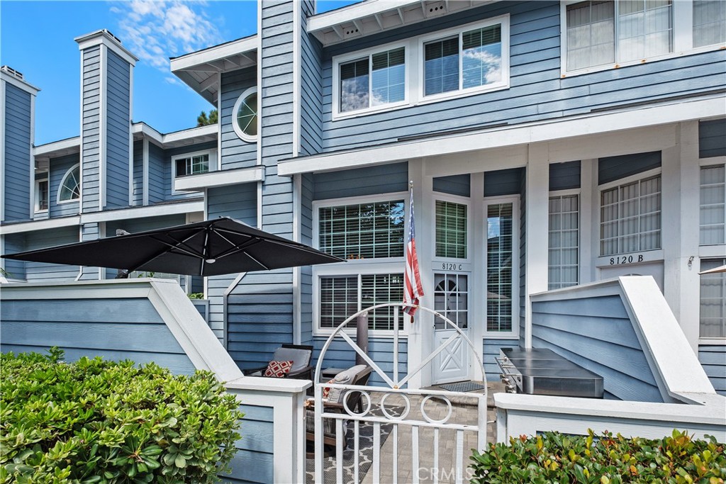 Soak in the serenity from the front courtyard of this beautiful Cape Cod style townhome in fabulous Seawind Cove. The interior has been thoughtfully updated with brand new carpet and new vinyl windows (2025) and includes a remodeled kitchen with refaced cabinetry, recessed lighting, and a wraparound granite breakfast peninsula with overhead pendant lighting. A newly tiled fireplace with custom mantel represents the centerpiece of the tall, vaulted ceiling living room, while elegant wood railings with wrought iron spindles highlight the dining room and stairwells.
The upper level includes 3 large bedrooms with a well-appointed primary complete with a luxurious en-suite bathroom offering a spa-like tub, dual vanities, separate shower, and a spacious walk-in closet.
The gated community itself is equally impressive, with a sparkling pool, relaxing spa, and a well-appointed clubhouse. Recent HOA improvements include newer roofs, siding, fresh paint, rebuilt composite patios, and newly paved asphalt streets.