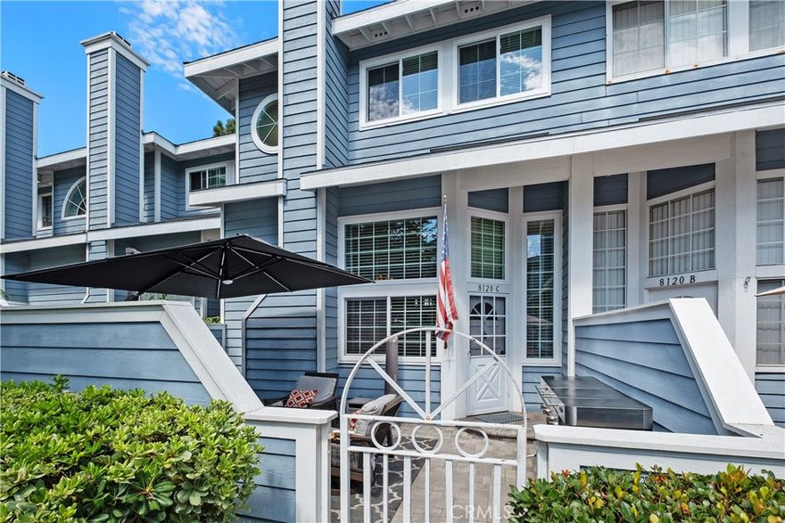 Soak in the serenity from the front courtyard of this beautiful Cape Cod style townhome in fabulous Seawind Cove. The interior has been thoughtfully updated with brand new carpet and new vinyl windows (2025) and includes a remodeled kitchen with refaced cabinetry, recessed lighting, and a wraparound granite breakfast peninsula with overhead pendant lighting. A newly tiled fireplace with custom mantel represents the centerpiece of the tall, vaulted ceiling living room, while elegant wood railings with wrought iron spindles highlight the dining room and stairwells.

The upper level includes 3 large bedrooms with a well-appointed primary complete with a luxurious en-suite bathroom offering a spa-like tub, dual vanities, separate shower, and a spacious walk-in closet.

The gated community itself is equally impressive, with a sparkling pool, relaxing spa, and a well-appointed clubhouse. Recent HOA improvements include newer roofs, siding, fresh paint, rebuilt composite patios, and newly paved asphalt streets.