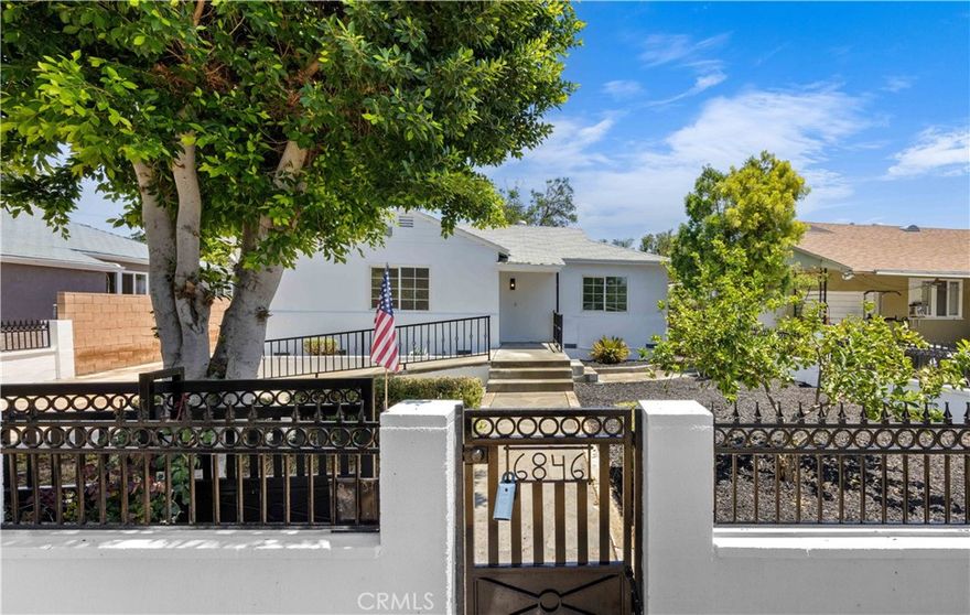 A Turnkey Gem in the Heart of Reseda! This beautifully remodeled 3-bedroom, 2-bath single-family home is the perfect starter opportunity, ideally situated on a quiet, suburban street in a desirable Reseda neighborhood. Thoughtfully updated throughout, the home features a brand-new kitchen and stylishly renovated bathrooms, offering modern comfort and convenience. Enjoy the ease of indoor laundry with washer and dryer included, and the security of a gated property with a detached two-car garage and generous storage space. The spacious lot also presents an excellent opportunity to build an ADU (Accessory Dwelling Unit)—perfect for additional rental income or multi-generational living. With close proximity to shopping, dining, schools, and major freeways, this move-in-ready home blends comfort, functionality, and long-term potential. Don’t miss your chance to own a home in one of the Valley's most accessible and up-and-coming neighborhoods!