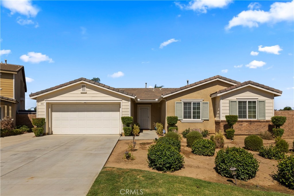 Welcome to 146 Gilia Street, nestled in the highly desirable McSweeney Farms community of Hemet. This charming single-story home offers 4 bedrooms, 2 bathrooms, and 1,723 square feet of living space on an 8,000+ square-foot lot.
Step inside to discover an open-concept layout, where the living room, family room, kitchen, and dining area flow seamlessly together—perfect for both everyday living and entertaining. The spacious family room features a cozy fireplace, while the kitchen boasts granite countertops and plenty of room for family gatherings and hosting friends.
The backyard is abundant in size, complete with a covered patio and wide side yards, giving you endless options for outdoor entertaining, gardening, or simply relaxing in the sunshine.
Living in McSweeney Farms means more than just a beautiful home—you’ll also enjoy exceptional community amenities, including a resort-style pool, spa, barbecue areas, playground, dog park, sport courts, biking, hiking, and horse trails. The impressive 18,000 square-foot clubhouse features a fitness center, recreation and meeting rooms, plus additional outdoor perks such as an amphitheater, community garden, and even 24-hour security.
With Diamond Valley Lake and the Western Science Center nearby, outdoor adventure and family fun are always within reach. Plus, the home is just a short drive to shopping, restaurants, and entertainment, with easy access to major highways—making this property as convenient as it is comfortable.
A must-see home that truly offers it all!