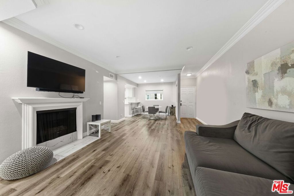 Welcome to your Sherman Oaks sanctuarya stunningly remodeled condo that blends modern design with everyday comfort. This spacious 2-bedroom, 2-bath home has been completely reimagined with brand-new floors, a chef's kitchen with quartz countertops and stainless steel appliances, and sleek, updated bathrooms that feel like a spa retreat.The open layout flows seamlessly to your private balcony, perfect for morning coffee or evening wine. With a newer AC system (just 2 years old), in-unit laundry, and two secure parking spaces, every detail has been thoughtfully upgraded for effortless living.Set within the desirable Fulton Terrace community, you'll enjoy resort-style amenities including a sparkling pool and controlled accessall just moments from Ventura Boulevard's vibrant dining, shopping, and nightlife.Move right in and start living the lifestyle you've been waiting for.