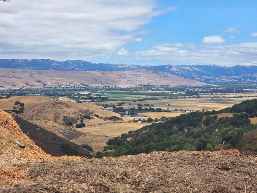 The subject is over 11 acres of beautiful land in Calero Lake Estates, just outside San Jose City limits. The estate lot is nestled at the top of a saddle; in the Santa Teresa hills above Calero Lake and Almaden Valley. The ridgeline to the South and 1.3-mile drive to Mc Kean road provides some privacy, while still allowing for Southern exposure on the right side of the estate for planting grapes or solar installation, while the ridgeline to the North shields the site from Coyote Creek valley and the 101 corridor.  Fire hydrants, water and buried electricity are on the road.  Sewer is by septic, with percolation tests already performed and leach field approved.  The center of the property is very gently sloped downhill from the road for maximum recreation enjoyment and usable land.The subdivision is surrounded on 3 sides by parklands, such as Calero County Park with Calero Lake, Santa Teresa County Park and Coyote Valley Open Space Preserve.  From McKean Rd, it is only 0.6 miles to the boat launch, about 5 miles to the 101 at Bailey Rd and about 7 miles to the Coyote Creek Golf Club.
