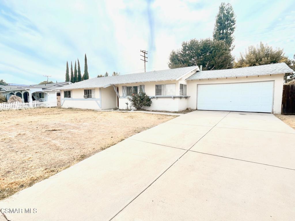 Here is your fix and save opportunity centrally located in Simi Valley. The home is clean with vinyl plank flooring but needs updates and your personal touch. The lot is extra large giving space for pool, ADU/guest house, outdoor kitchen... what ever you want and has a pomegranate and lemon tree. The home offers a good sized kitchen that flows into a dining area which flows to a spacious living area. Down the hall are a full bathroom, three bedrooms and a primary with its own full private bathroom. Make this home your dream home.