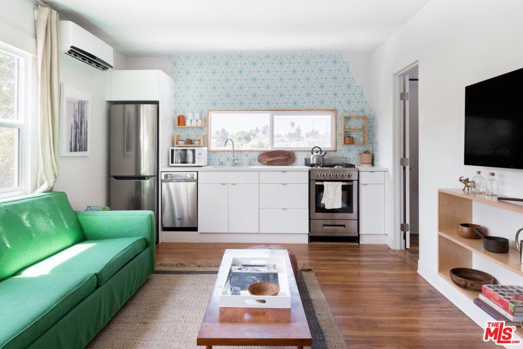 Hip and inviting 2bed 2bath home in the coveted hills of Echo Park just South of Sunset and blocks from Echo Park Lake. Abundant natural light and large bedrooms with their own private bathrooms are among the highlights of this tranquil home. Original, refinished hardwood floors run throughout the unit which has also been suited with many modern designer upgrades. Kitchen includes white euro cabinets, white quartz countertops as well as all brand new appliances. The bathrooms include a glass-encased shower with designer tile. This home is cooled and heated by a powerful A/C + heater and comes with an in-unit washer dryer. Enjoy reading your favorite book on your private balcony or sipping on your favorite cocktail. Being located just South of Sunset will allow you to enjoy everything that Echo Park has to offer. One off-street, gated parking space available for an additional $100 per month.