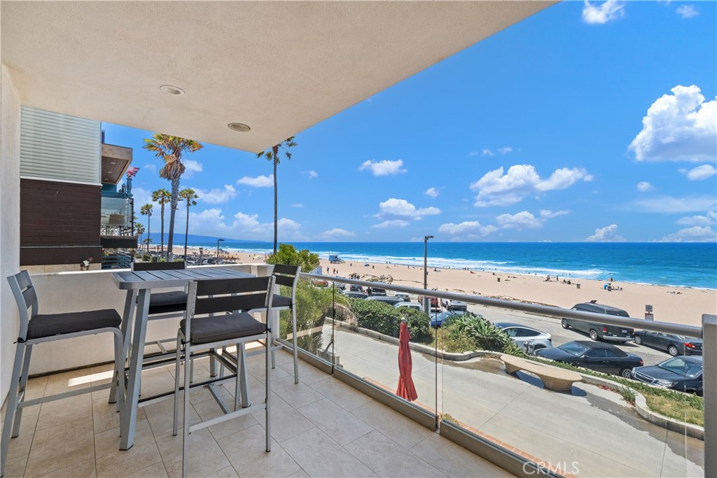 Welcome to your perfect coastal haven on The Strand in Manhattan Beach—where life truly doesn’t get better than this. Sweeping, unobstructed ocean views set the stage for a home that delivers on every front. It’s all wide open and wonderfully unfussy—kitchen, dining, and living areas linked together in a bright, ocean-facing sprawl made for morning coffee or sunset cocktails.
There are 3 bedrooms, each of which is luxuriously appointed with its own designer en-suite bath, offering comfort and privacy in equal measure. The Primary Suite is a true sanctuary, occupying its own private level directly opening onto a tranquil patio across from the sand.  
This impeccably furnished residence includes every amenity imaginable, including state-of-the-art AV equipment, high-speed Starlink internet, and ample parking. The tandem garage (which may accommodate two cars, depending on size) includes a Tesla charger, and there’s an additional shared carport for convenience.