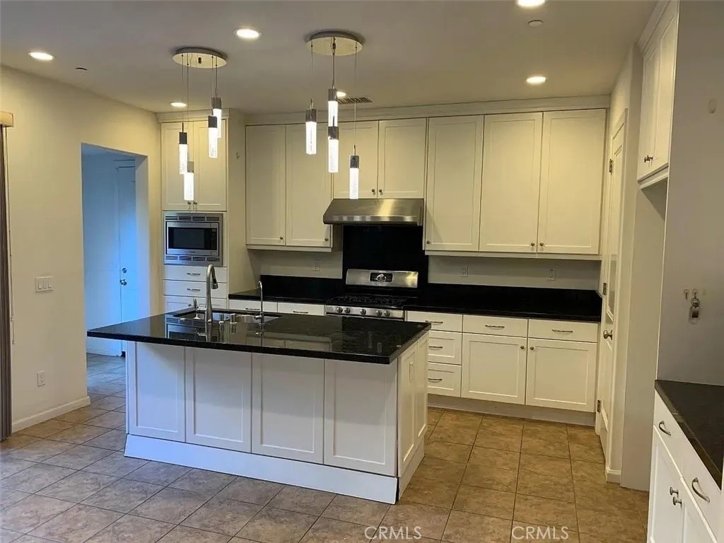Solar system means almost no electric bill for tenants! This amazing home is situated in conveniently located and beautiful community of Cypress Village. Within walking distance to Cypress Valley Elementary and multiple parks you have an abundance of open outdoor space. The kitchen is updated with dark with granite countertops and includes a chefs dream walk-in pantry. Kick off your shoes to feel the brand-new carpet throughout your new home. The attached two car garage provides plenty of overhead storage for your weekend hobbies. As you walk upstairs you will arrive at the open loft. This bonus space can serve as a convertible office, media space, kids play area, or just a relaxing retreat. With upstairs laundry you don't have to worry about taking laundry up and down stairs. Enjoy your Master bedroom suite with walk-in closet, bathroom with dual sink vanity, and a walk in shower. Privacy is provided due to separation by the loft from the other bedrooms. The 2nd and 3rd bedrooms share a Jack-and-Jill style bathroom and are adjacent to the laundry room (bring your washer and dryer of choice). Enjoy the convenience of your morning commute with only a few minutes drive to the major freeways and toll road. This beautifully maintained community also includes multiple pools and spas when you just need to relax. Don't forget one of the major values of this location: the world famous Irvine Unified School districts. The solar system is provided as part of the rent so you may not have to pay for electricity. This cozy home in a wonderful location is ready for you to settle in and call home.