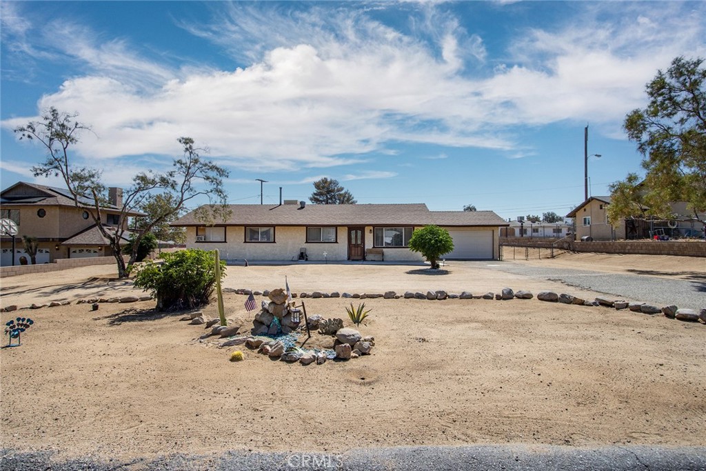 HOME SWEET HOME!Reduced to sell!Welcome home at 7103 Hanford Avenue, located in the picturesque town of Yucca Valley! This charming property offers an easy-going lifestyle with stunning mountain views and a spacious backyard. With four bedrooms and two bathrooms, this spacious home features a large 2-car garage, creating a peaceful and private retreat for those seeking tranquility.
Enjoy the convenience of natural gas, along with recent upgrades such as a brand-new roof and freshly painted interiors. The living areas are bright and airy, thanks to large windows that flood the space with natural light, adding to the inviting atmosphere. A beautifully remodeled bathroom brings a touch of modern elegance to the home. The expansive lot includes a fully fenced backyard, making it perfect for outdoor activities or accommodating your toys and an RV.
Situated in the highly sought-after community of Yucca Valley, this property offers easy access to shopping, dining, entertainment, and outdoor adventures. Nearby, Joshua Tree National Park awaits, offering beautiful hiking trails, impressive rock formations, and breathtaking desert scenery. With plenty of off-street parking available, you'll be ready to explore local attractions like Pioneertown and Pipes Canyon, or take a quick trip to Palm Springs.
This unique opportunity is perfect as a primary residence, a vacation getaway, or an excellent short-term rental. There are currently no rental restrictions set by the local municipality, making this an ideal investment to supplement your expenses. Don't let this incredible opportunity pass you by!Broker/Agent does not guarantee the accuracy of information obtained from the seller, public records, appropriate professionals or other sources, Buyer is advised to independently verify the accuracy of square footage, lot size, ordinances, zoning, rent control, permits, use code, HOA-CC&R content, suitable specialists and/or other information concerning the conditions or features of the property.